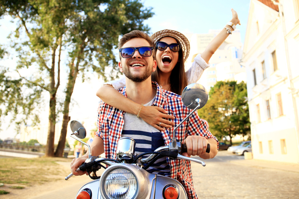 Couple in love riding a motorbike